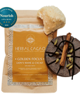 Herbal Cacao 'Golden Focus' ceremonial cacao with a Lion's Mane and Cacao blend, shown with a dried lion's mane mushroom, a cinnamon stick, and cardamom on a white background with a 2026 Food & Drive Awards badge.