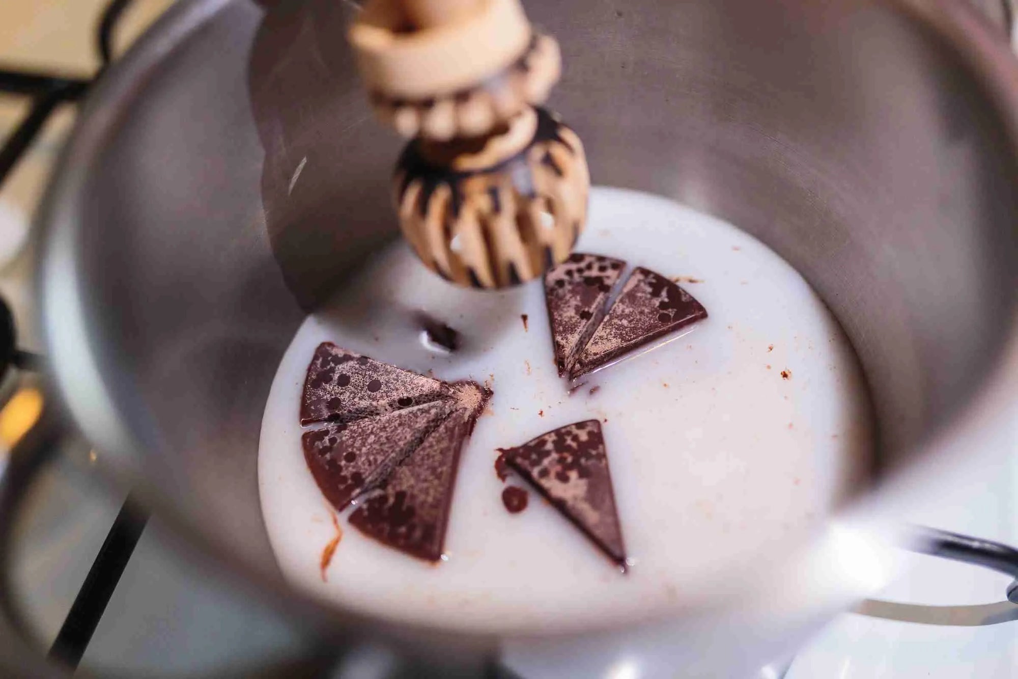 Ceremonial cacao bar on natural surface with wooden background