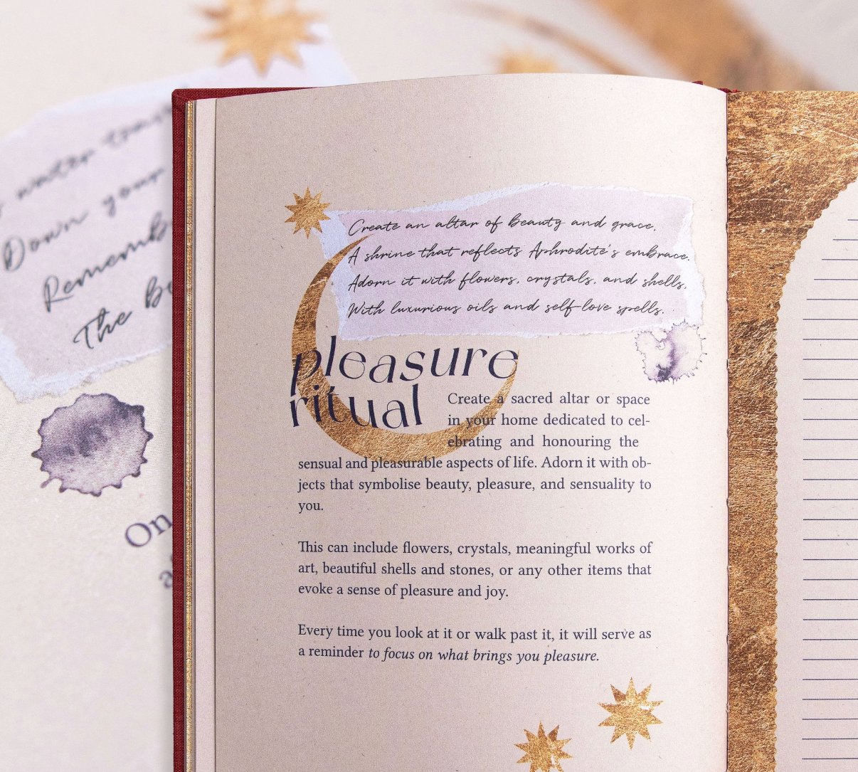 Open journal with decorative text and illustrations on a textured surface