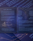Open dream journal book with text and illustrations on a blue background