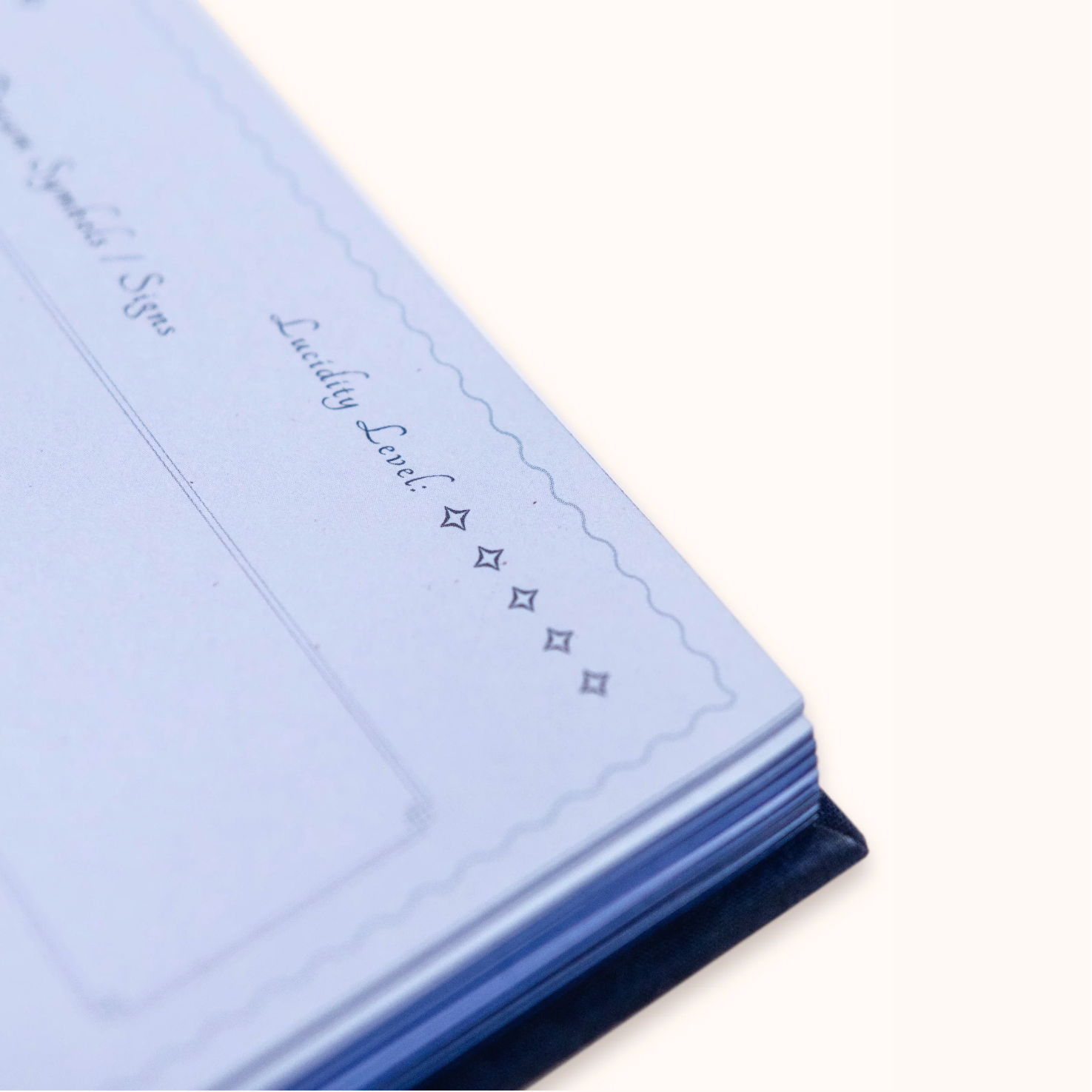 Folded light blue fabric with text on a white background