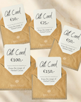 Set of Herbal Cacao gift cards in envelopes on a beige background