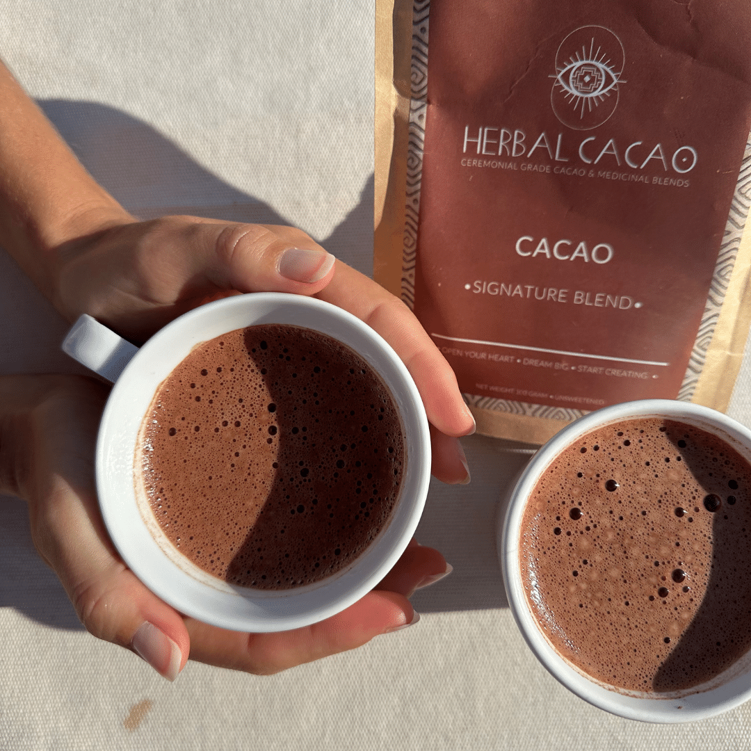 Signature Blend holding cacao drinks